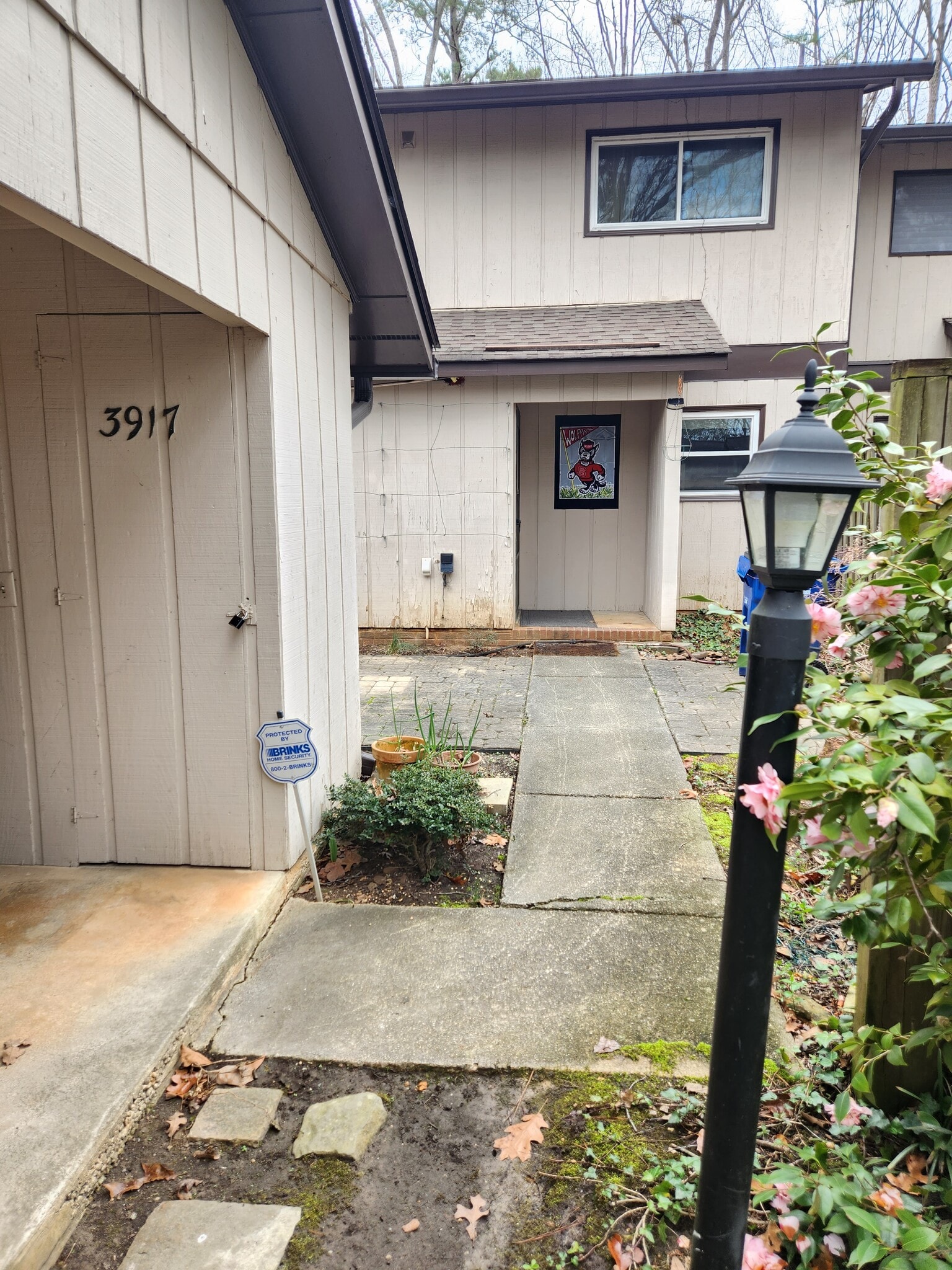 Entry passing a paved front yard - 3917 Wendy Ln