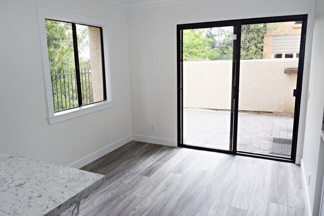 Building Photo - Price Reduced! Stunning 4BR/2.5BA Two-Story Renovated Townhome in UTC!