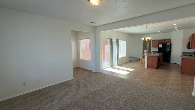 Building Photo - 3 Bedroom Town Home Near Rio Bravo Blvd SE & University Blvd SE In Mesa Del Sol!