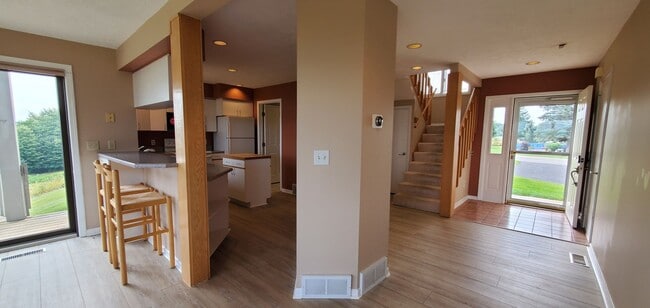 Building Photo - Lakefront End-Unit Condo with Crystal Lake...