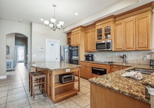 Building Photo - Gulf-Front Luxury Townhouse | 4 Bedrooms + Loft | Sleeps 17 | Game Room & Elevator