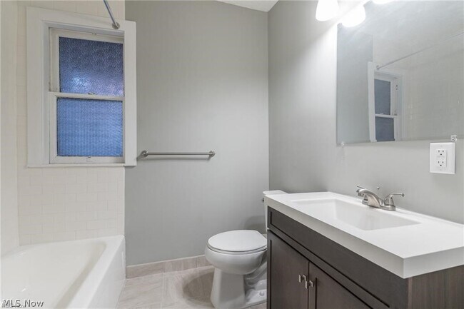 Building Photo - 1387 W 69th St