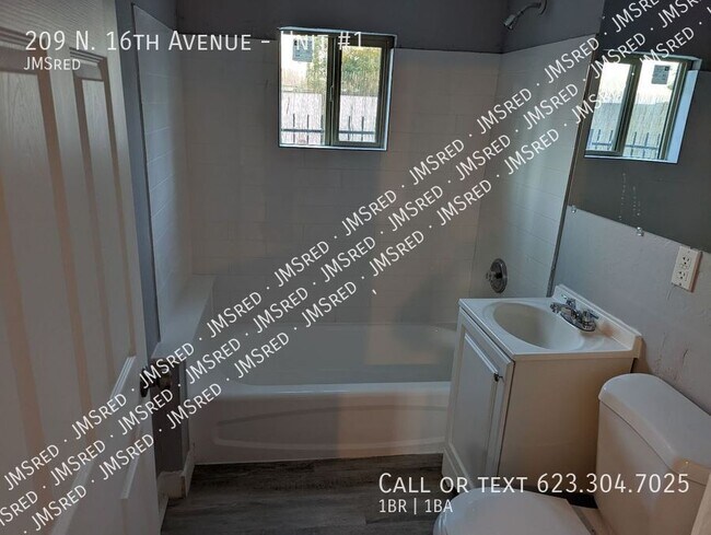Building Photo - 209 N 16th Ave