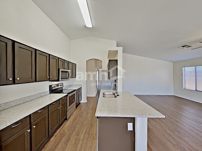 Building Photo - 7547 W Vermont Ave