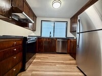 Building Photo - **$1000 DEPOSIT + FREE FIRST MONTH'S RENT** Spacious Townhouse in the Heart of Garden Home~ New L...