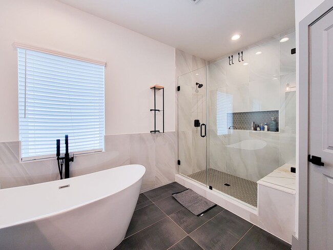 Building Photo - This 4-bedroom, 3-bathroom, two-story residence comes with a generous two-car attached garage. Re...