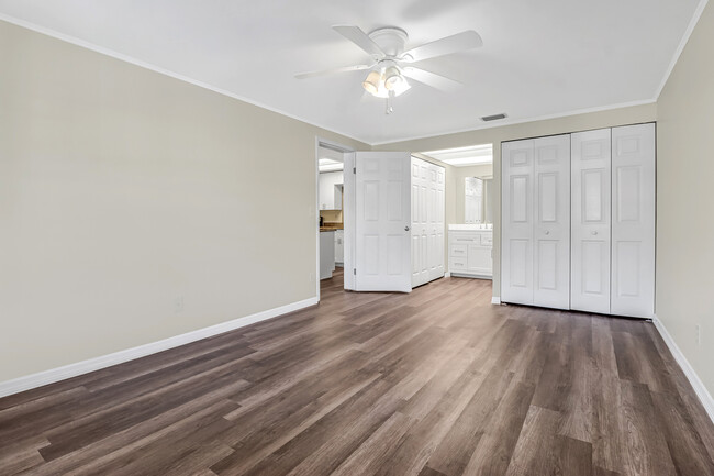 Vinyl flooring in primary bedroom - 5393 Treetops Dr