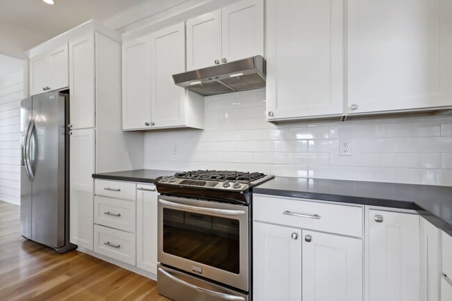 Building Photo - DESIRABLE CRESTON-KENILWORTH / CORNER LOT, LUXURY 4 BEDROOM, TWO EN-SUITES W/FULL BATHS