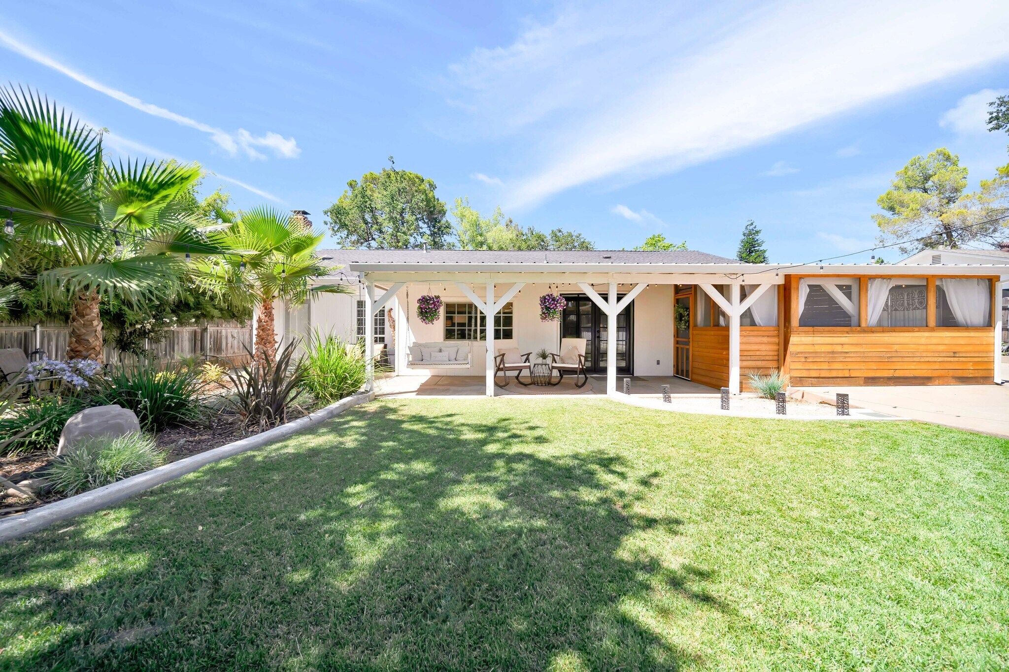 Covered porch with swing - 3075 Forest Hills Dr