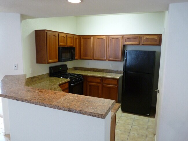 Building Photo - GATED 2 BEDROOM, 2 BATH CONDO IN JASMINE RANCH COMMUNITY