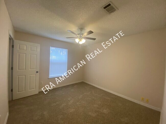 Building Photo - 7418 Woodmont Rd