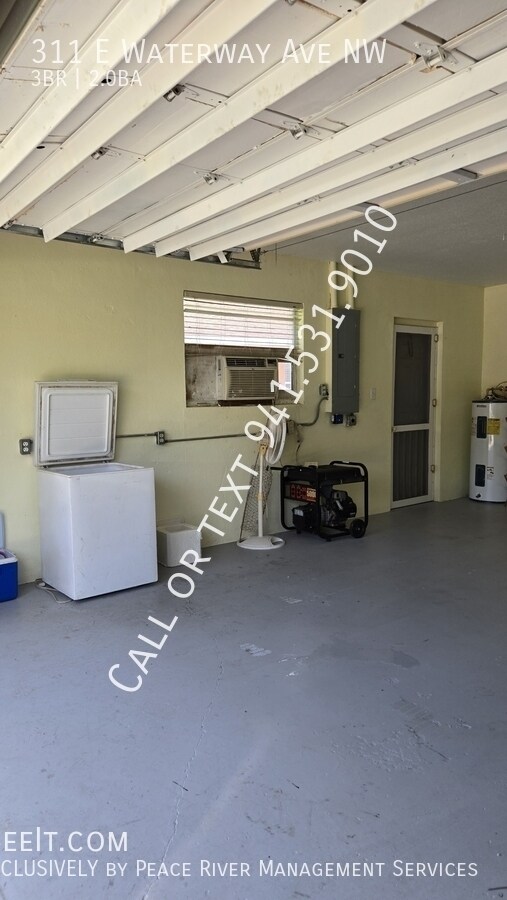 Building Photo - 311 E Waterway Ave NW