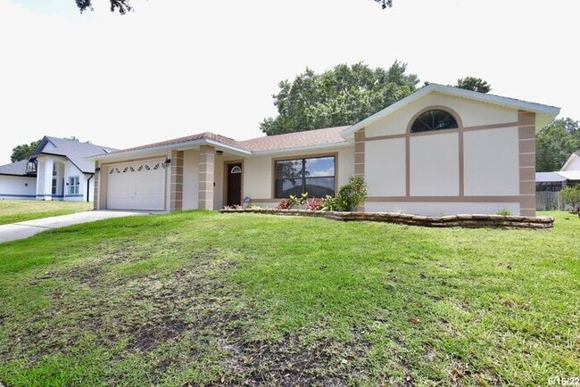 Building Photo - Cozy 3/2 Split Floorplan Home with a Spaci...