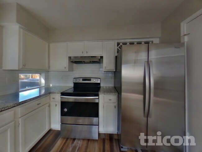 Building Photo - 7114 River Garden Dr