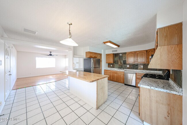 Building Photo - 3408 W Port Au Prince Ln