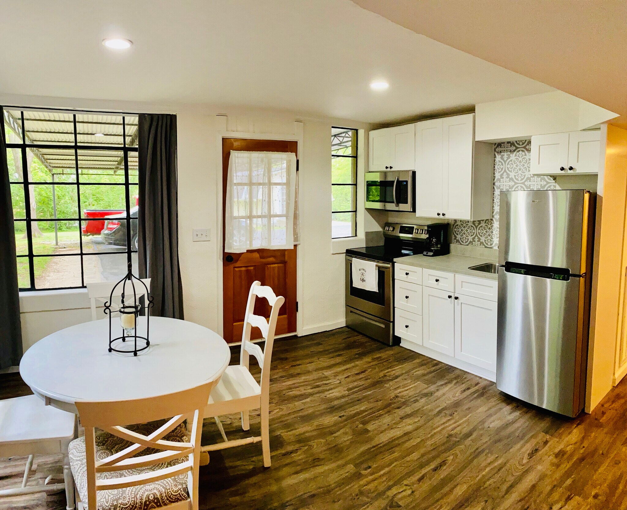 New gorgeous kitchen remodel that includes a stove and full size fridge. - 806 Potter Ln