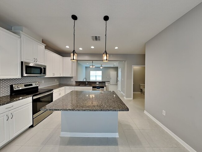 Building Photo - 7929 Ava Jade Aly