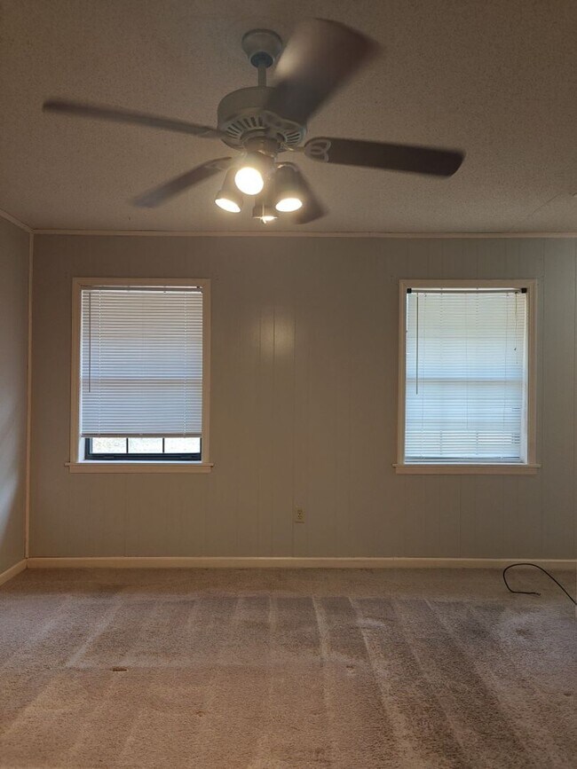 Building Photo - Elegant & Spacious 3-Bedroom Brick Home with Private Garage