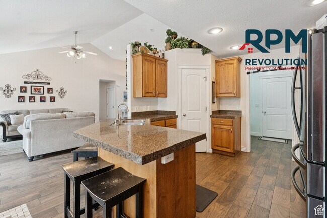 Building Photo - "Spacious 6-Bed Gem with Granite Touches & Cozy Fireplace in Morgan!"