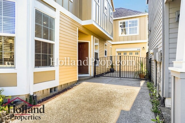 Building Photo - Charming 3-Bedroom Home with Wood Floors, Gas Fireplace & Private Patio