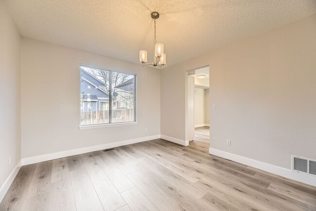 Building Photo - 4 bedroom, 2 1/2 bath home with attached 2...