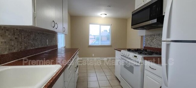 Building Photo - 6415 E 36th Ave