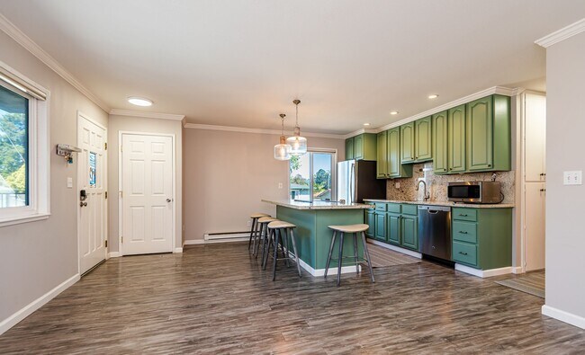 Building Photo - 1 MONTH FREE! Coastal Living at Anchor West | Ocean View Condo Just Minutes from Capitola Village