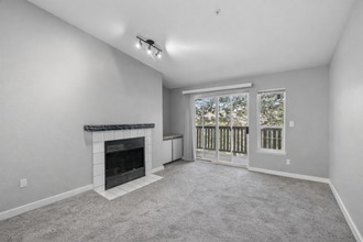 Building Photo - 2BR Condo w/ Vaulted Ceilings, W/D, Parking & Amenities