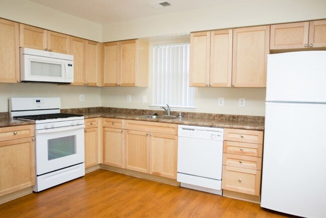 Kitchen - Bellevue Homes - No Cost Utilities*