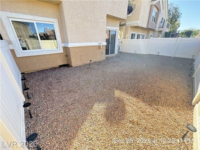 Building Photo - Cozy Gated Townhome with Private Yard, 2-Car Garage & Community Pool!