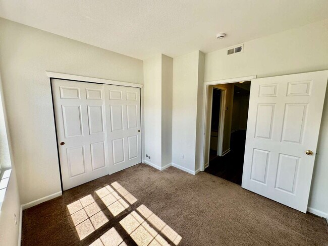 Building Photo - "Spacious 2-Bed, 2-Bath Condo with Pool Ac...