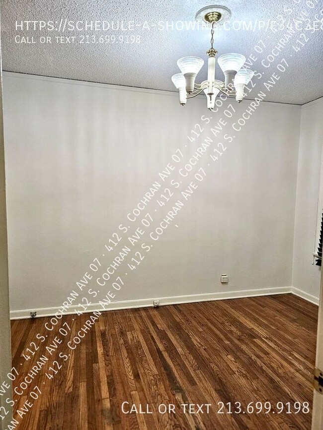 Building Photo - NO SECURITY DEPOSIT- Large Charming 1 Bedr...