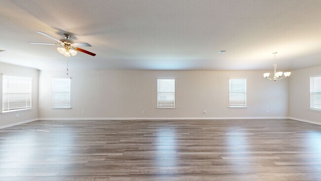 Building Photo - Discover this spacious 4-bedroom, 2-bath home with 3 CAR GARAGE!!!