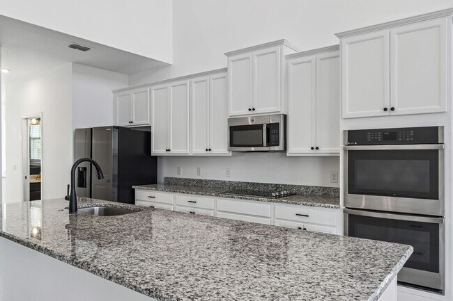 Building Photo - Amazing 5/3.5/2 House in The Reserve at Pine Tree