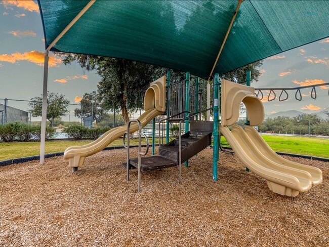 Building Photo - Spacious Living in a Gated Community with Resort-Style Amenities!