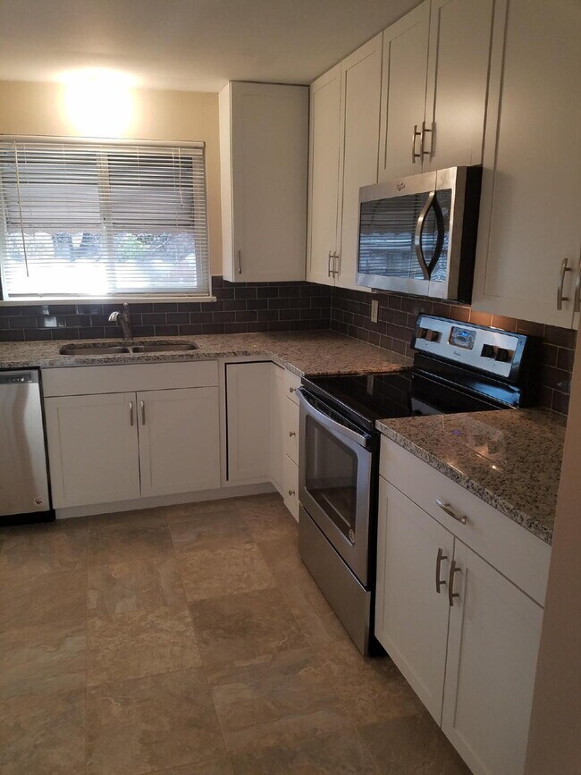 Building Photo - ***COMING SOON***  Spacious 4-Bedroom Wheat Ridge Home with Finished Garden Level and Two-Car Garage