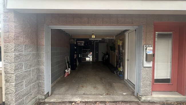 Attached 1+ car garage with ski rack and shelving - 505 W Doty St