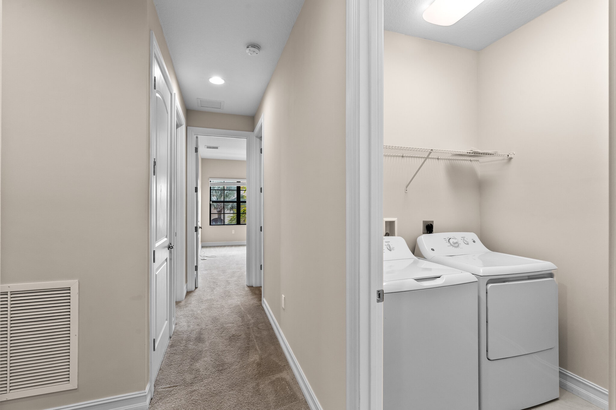 Laundry room upstairs. - 10103 Akenside Dr