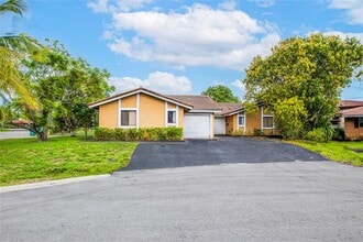 Building Photo - 7942 NW 37th Dr