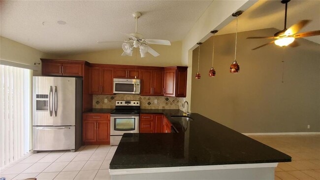 Building Photo - 3853 Carambola Cir N