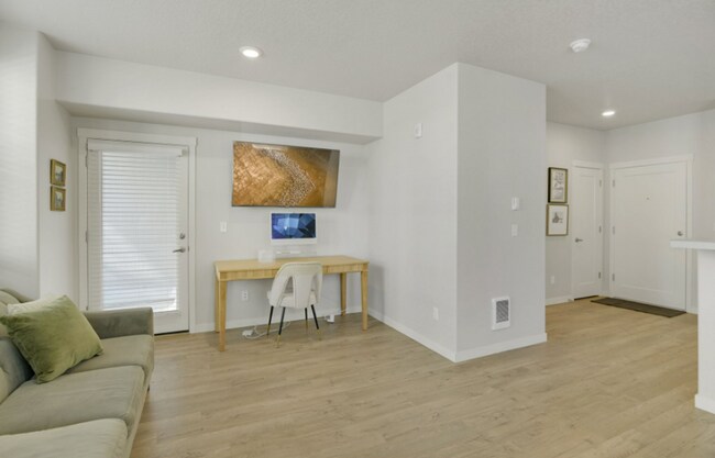Building Photo - Modern Ground-Level Condo in River Terrace...