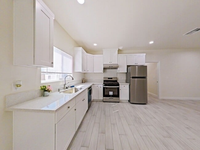 Building Photo - NEW CONSTRUCTION: Modern ADU with Private Entrance!