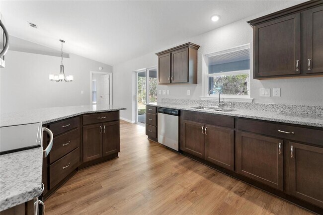 Building Photo - 9461 N Sandree Dr