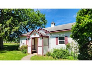 Building Photo - Cozy Country Living with Modern Updates