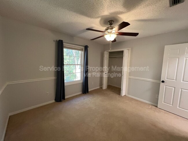 Building Photo - 6004 Players Pl