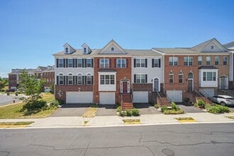 Building Photo - This beautiful townhome spans three finished levels and over 2800 square feet.