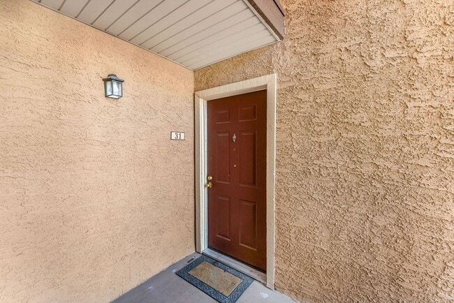 Building Photo - Guard-Gated Condo Living with Resort-Style Community Amenities!