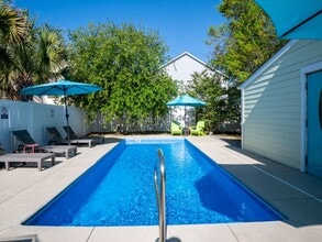 Building Photo - OFF-SEASON MONTHLY BEACH LIVING AWAITS!