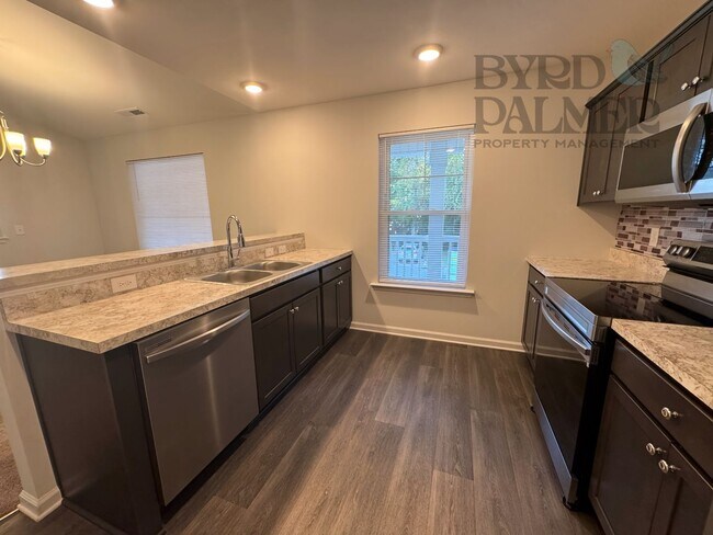 Building Photo - TURNING STONE