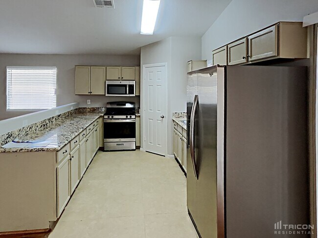 Building Photo - 8812 N Ceuta St
